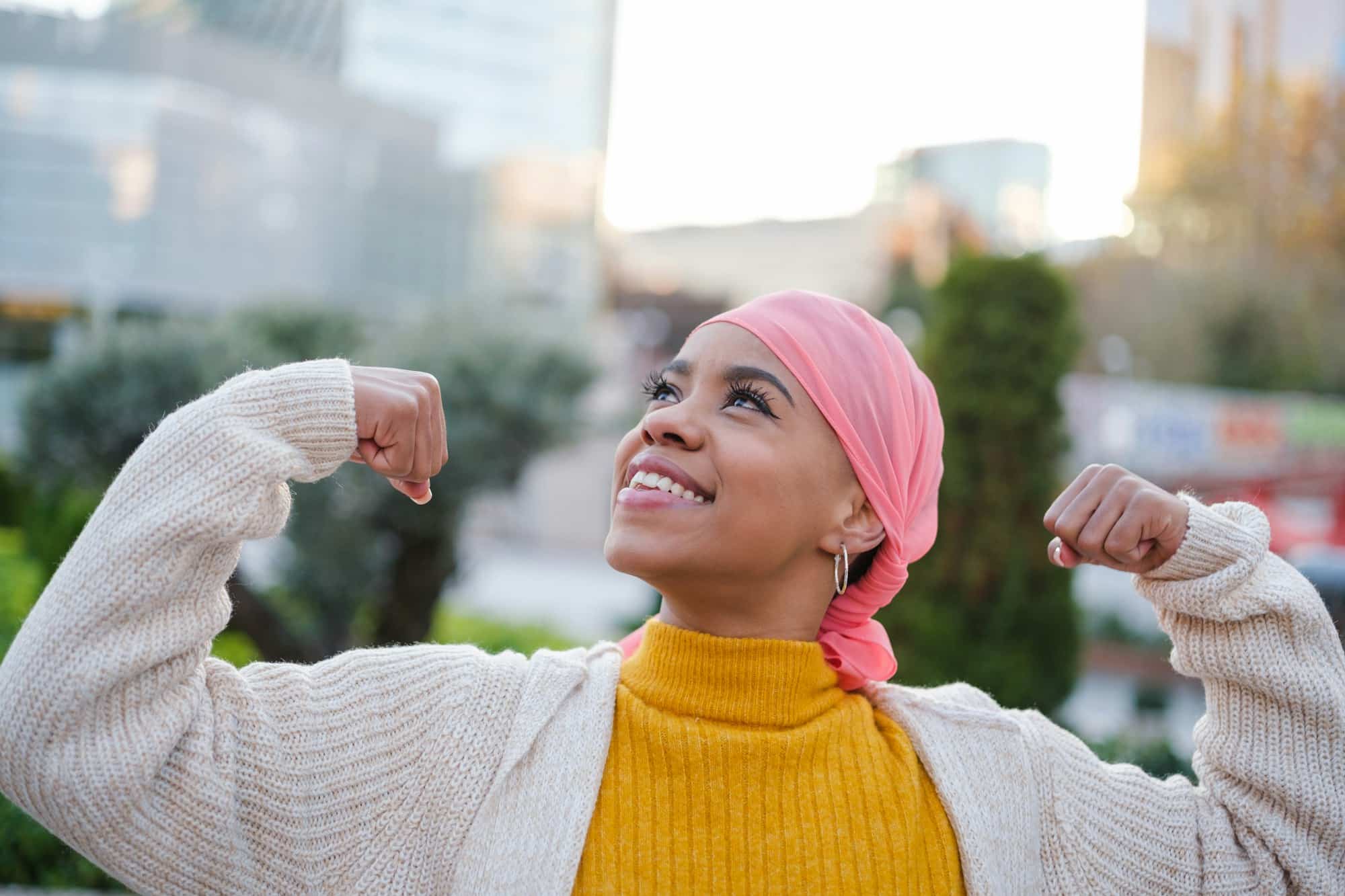 Sick woman with cancer showing strength to fight the disease with great courage.